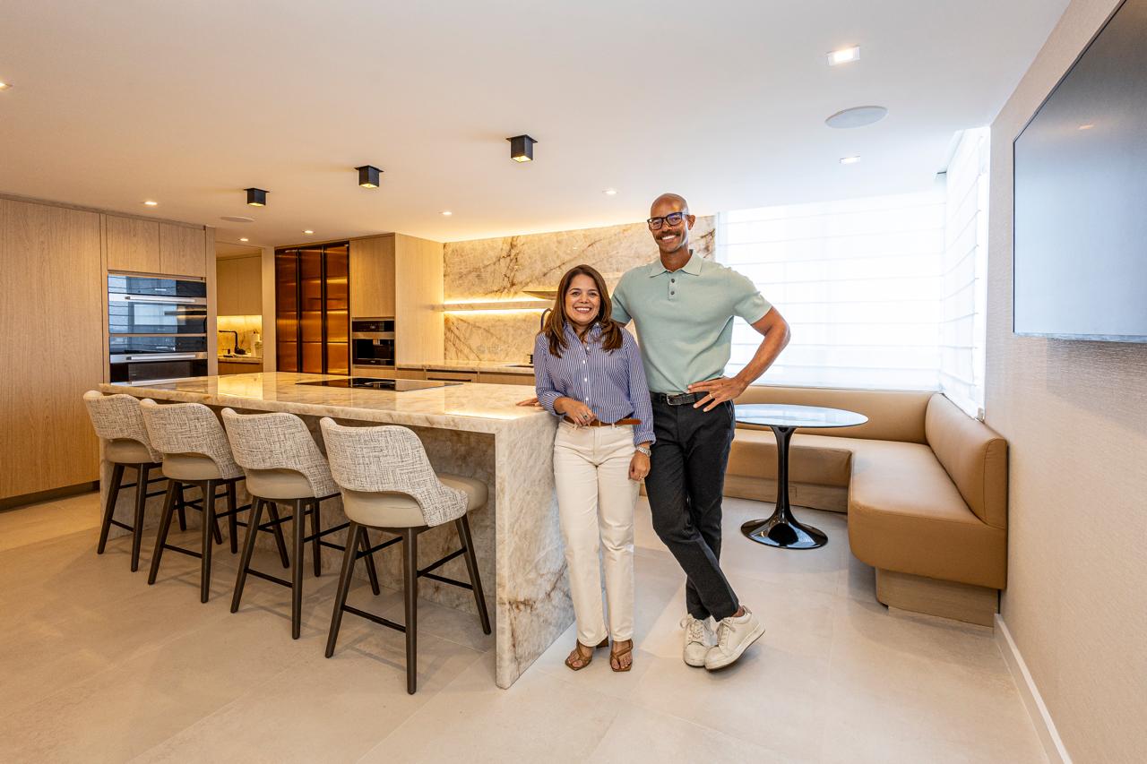 777 Bayshore 1503 — Homeowners at the kitchen island